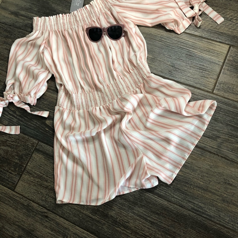 143 Story by line up Pink and white Romper
